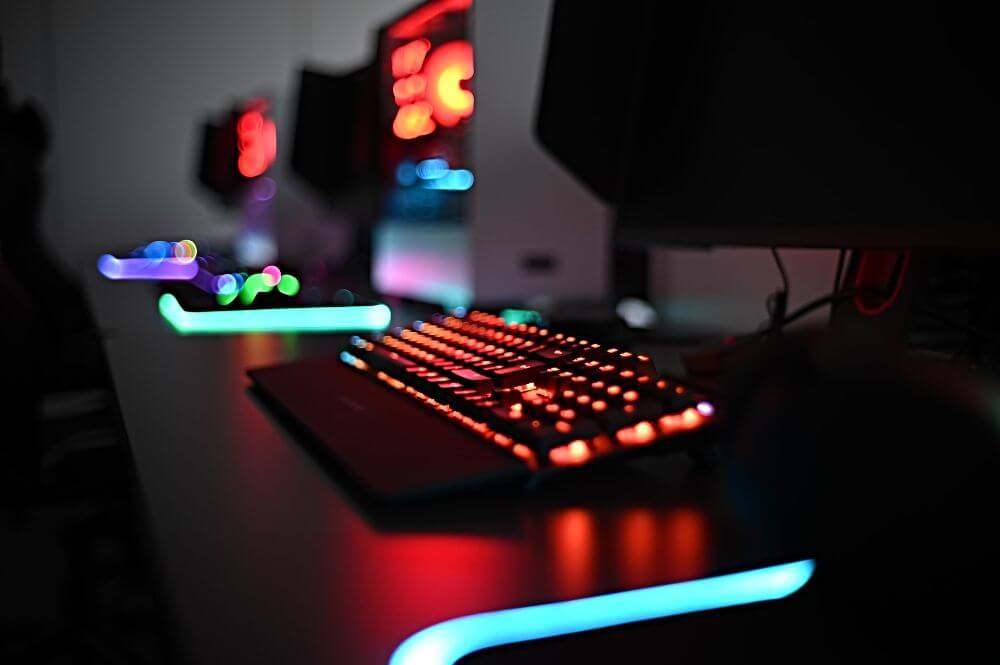 Esports gaming computers, lit up in the dark